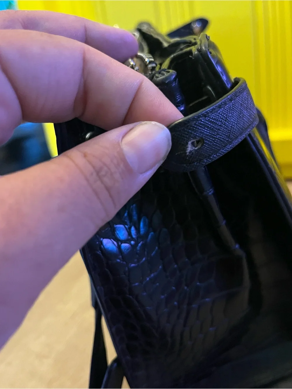 Guess Black Embossed Satchel Bag in good condition except missing one button